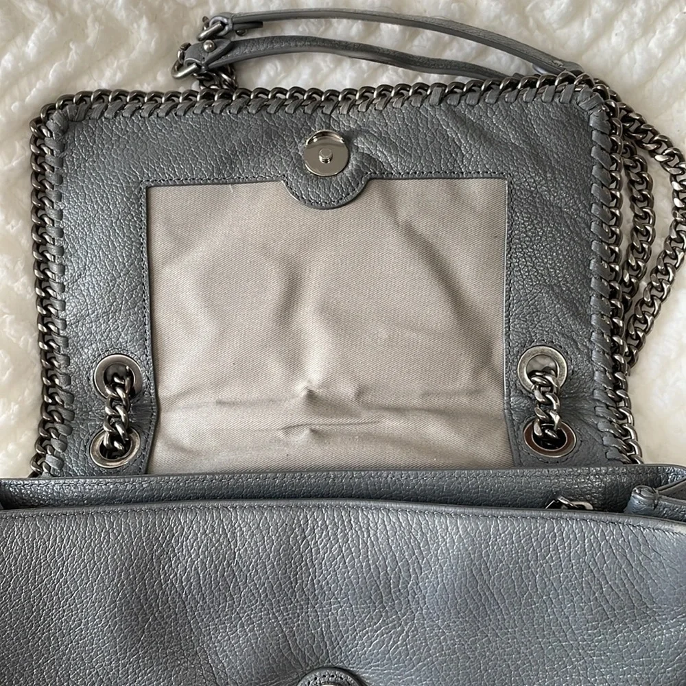 Edie flap shoulder bag with woven chain